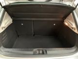 a trunk of a small car with its doors open