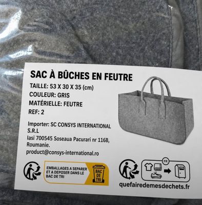 a bag that is sitting on the back of a couch