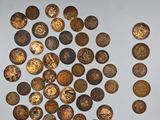 a lot of coins that are on the wall