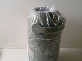 a bag of toilet paper sitting next to a toilet paper roll