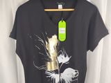 the shirt is black with a gold feather on it