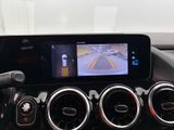 a picture of a car dashboard with a camera on the dash