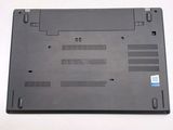 a black laptop that is sitting on a white table