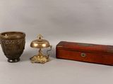 three different types of vases sitting next to each other on a table