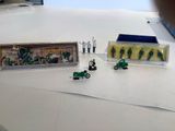 a small collection of toy vehicles on a table