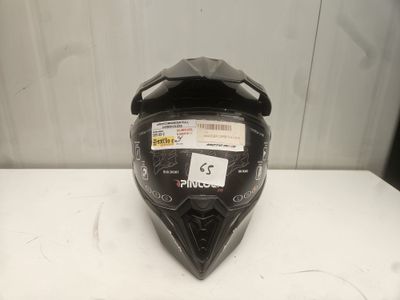 a close up of a motorcycle helmet on a table