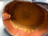 a close up of a hat on a table