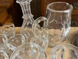 a lot of glass items on the table together