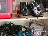 a shelf with a lot of electronics on it
