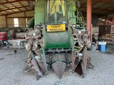 a tractor that is parked inside of a building