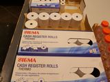 boxes of toilet paper and other items are on a table
