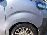 a close up of a car with a flat tire