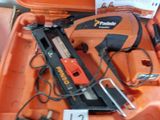 an orange tool box with a stapler, stapler, and stapler in it