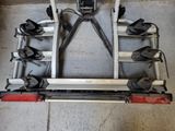 an overhead view of a bike rack with multiple bicycles