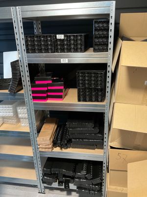 many boxes and boxes on the shelves in the store