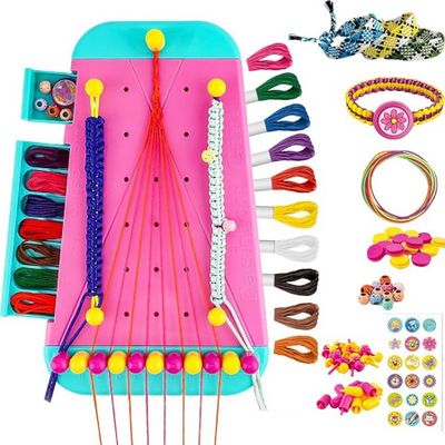 a pink case with a bunch of craft supplies on it