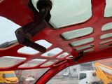 a view of the inside of a vehicle from the driver ' s seat