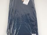 the blue shirt is wrapped in plastic and ready to be shipped