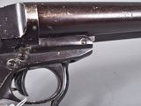a close up of a gun on a table