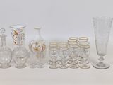 a lot of glass items that are sitting on a table