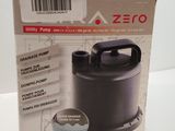 packaging of a black electric water pump sitting on top of a white table
