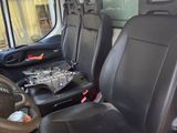 an image of a van with seats and a steering wheel