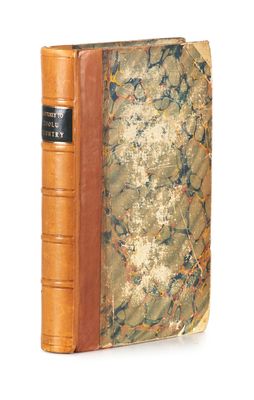 an old book with a brown cover and a brown leather binding