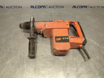 an image of a drill on a metal surface