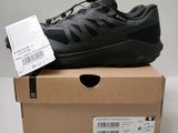 a close up of a shoe in a box on a table
