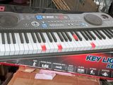 a keyboard that is sitting on top of a box