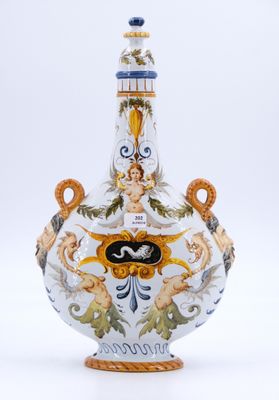 un vase blanc orné d'un motif bleu et jaune