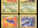 four different pokemon cards with different designs on them on a black background
