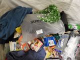 a pile of items that are on a bed