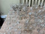 a lot of empty wine glasses on the table