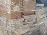 many boxes stacked on top of each other on a pallet