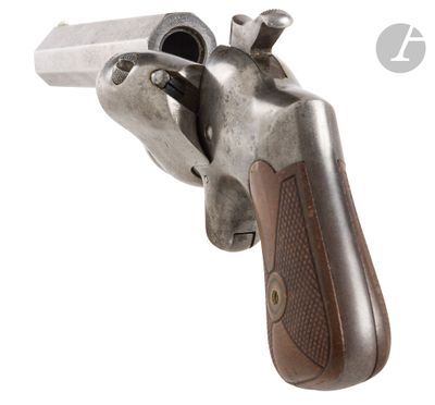 a gun with a wooden handle on a white background