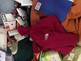 a pile of clothes and other items in a plastic bag