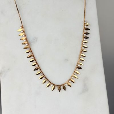 le collier à pointes en or