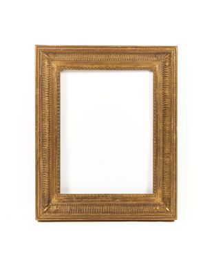 a gold picture frame on a white background
