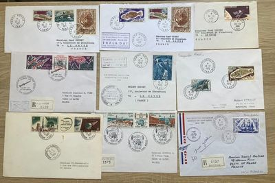 many different types of stamps on the envelopes