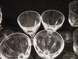 a lot of empty wine glasses sitting on a table