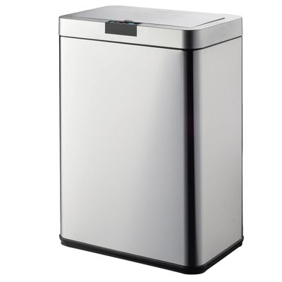 a close up of a metal trash can on a white background