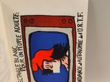 an open book with a picture of a man and a woman on it
