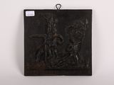 une plaque ancienne en fonte représentant une scène mettant en scène un homme et une femme