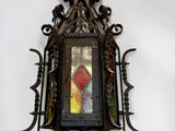 a picture of a stained glass hanging on a wall