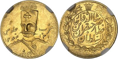 a gold coin with an image of a man in a top hat