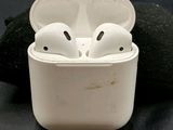 a pair of airpods that are sitting in a case