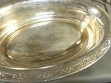 a silver plate that is sitting on a table