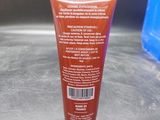a close up of a tube of toothpaste on a counter