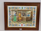 framed picture of a painting of a woman and a man in a kitchen
